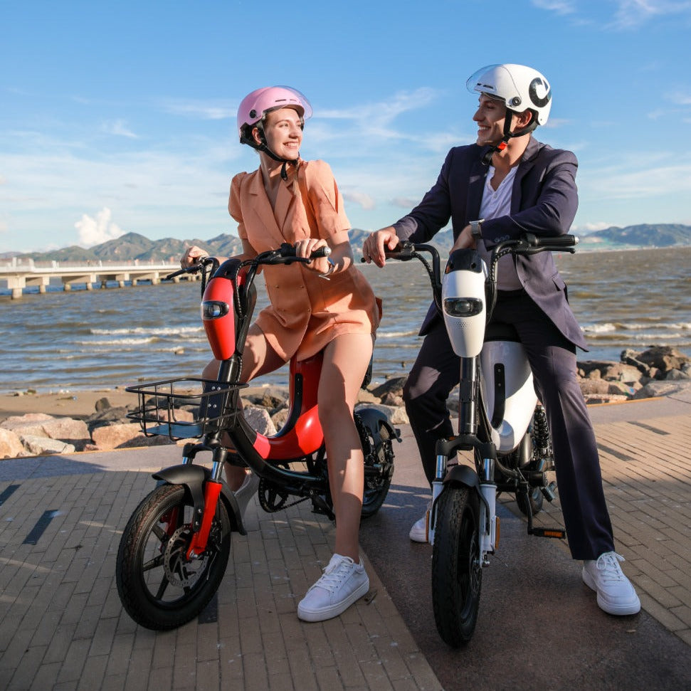 Man and Woman on the new DYU L1 Electric Bike.