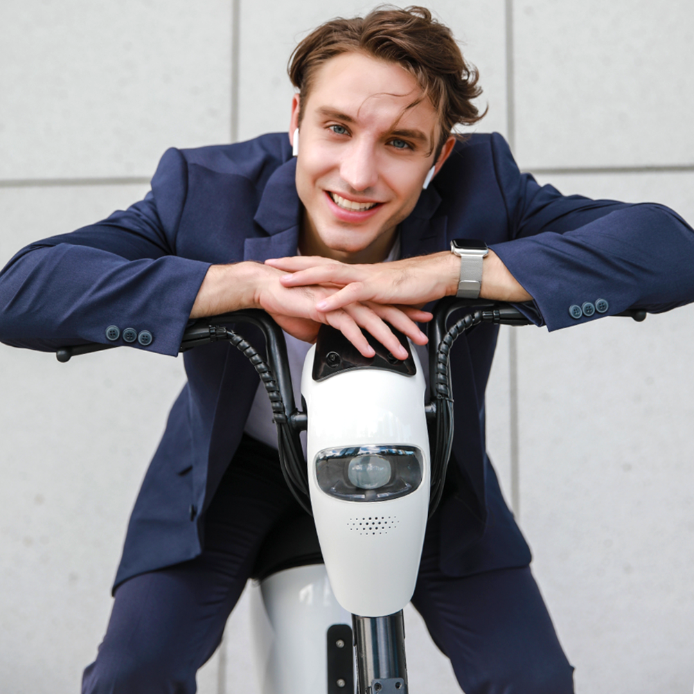 Close up of a business man, on the DYU L1 Electric Bike.